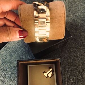 Michael Kors rose gold watch.